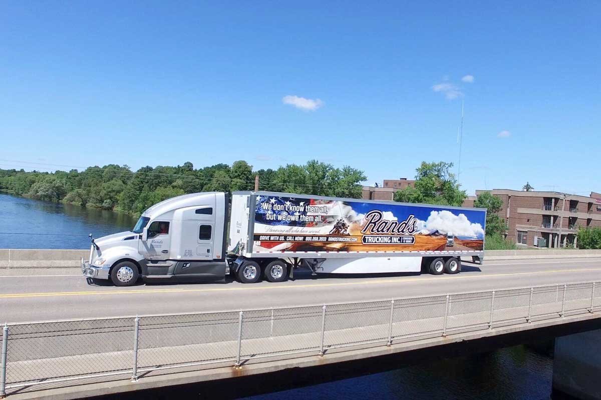 Rands Truck driving over bridge