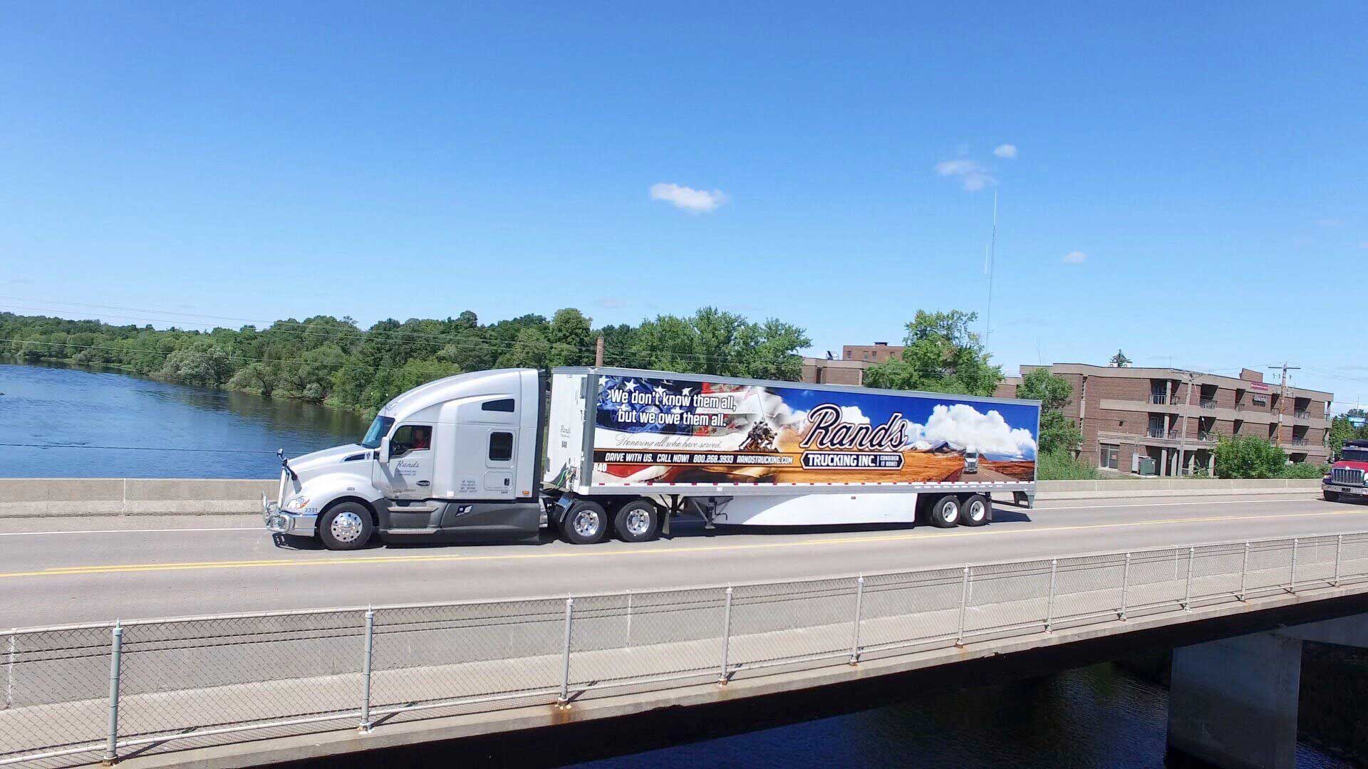 Rands Truck driving over bridge